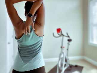 Woman stretching her back