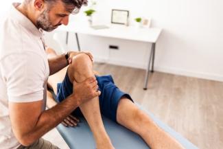 Provider helping patient