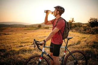 Mountain biker taking a water break